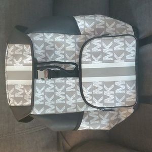 Michael Kors coated canvas back pack. Black and white
